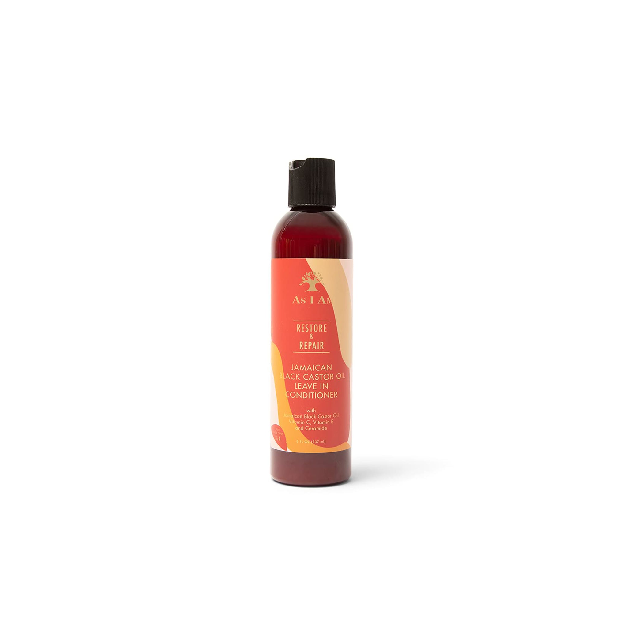 As I Am Jamaican Black Castor Oil Leave-in Conditioner 237ml. En brun plastikflaske med en sort skruekappe står mod en neutral baggrund.