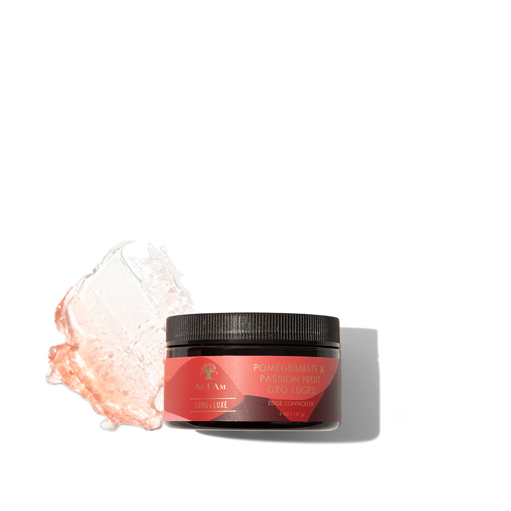 En sort beholder As I Am Long & Luxe GroEdges (113 g) med en lyserød etiket, der vises ved siden af en lille mængde af det lyse, geléagtige produkt.