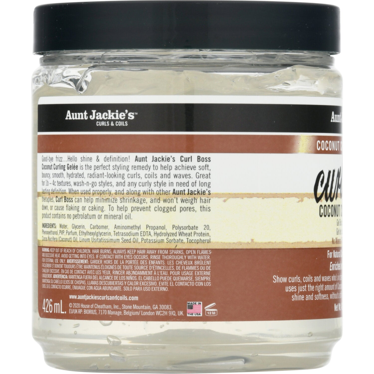 Bagsiden af Aunt Jackie's Curl Boss Coconut Curling Gelée i klar beholder. Etiketten beskriver fordele som bløde, hydrerede krøller, definition og minimal krympning.