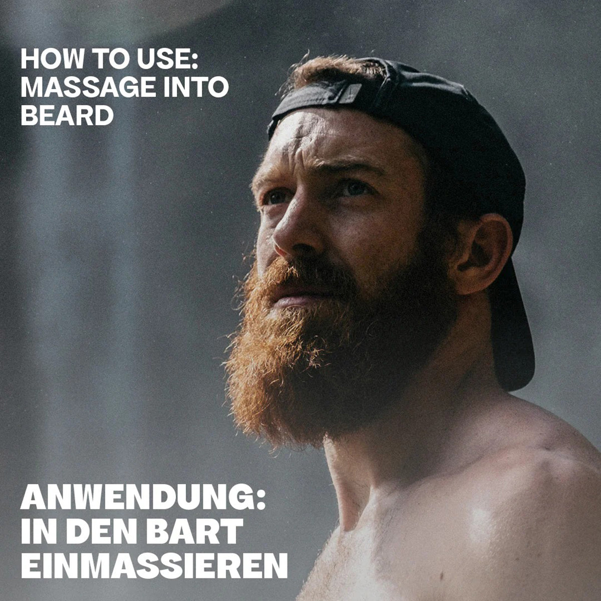 Man with full, auburn beard and cap demonstrates the use of Bali Gents Beard Oil 30ml by massaging it into the beard.