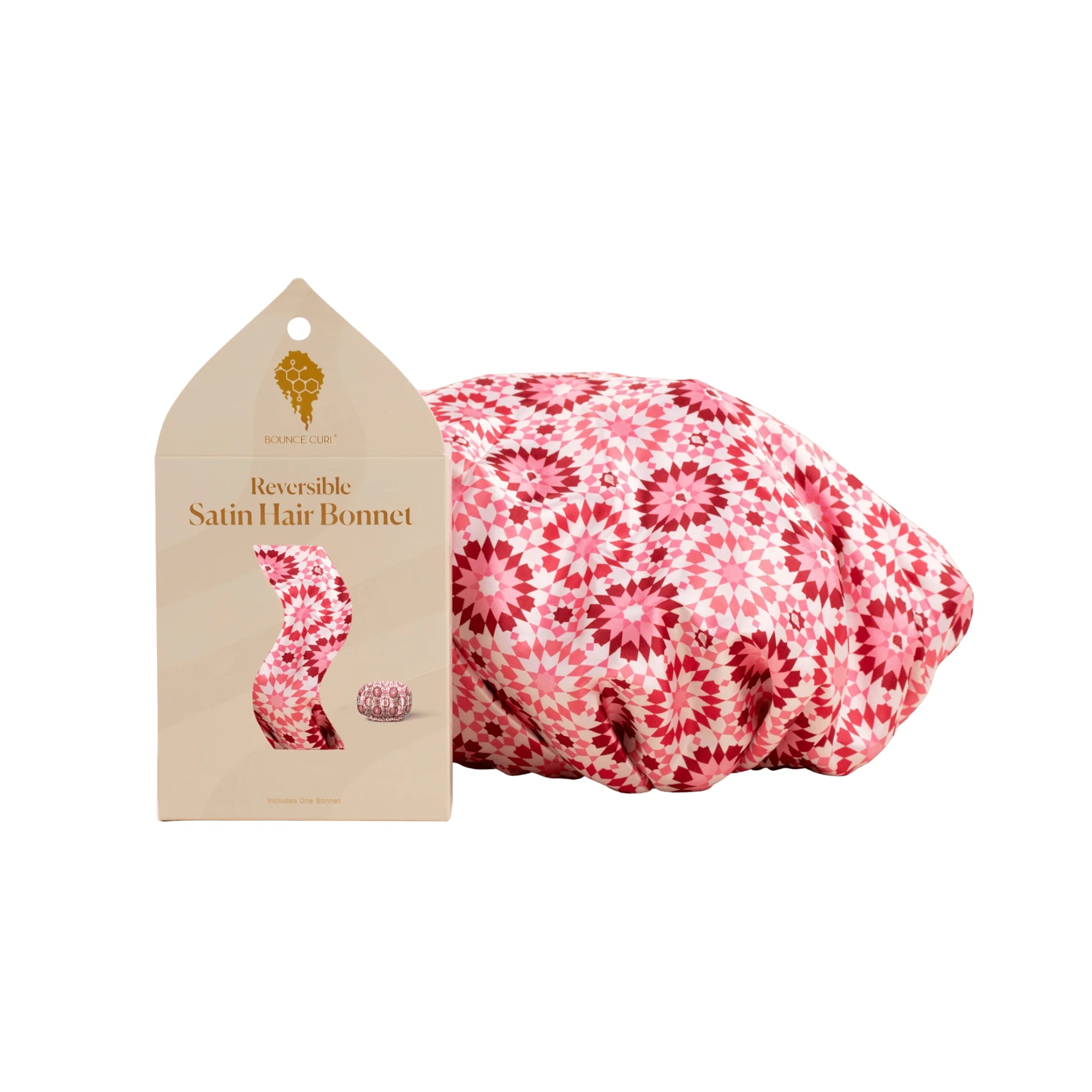 Reversible Satin Hair Bonnet i pink blomstermønster med beige emballage og elastik, fra Bounce Curl.