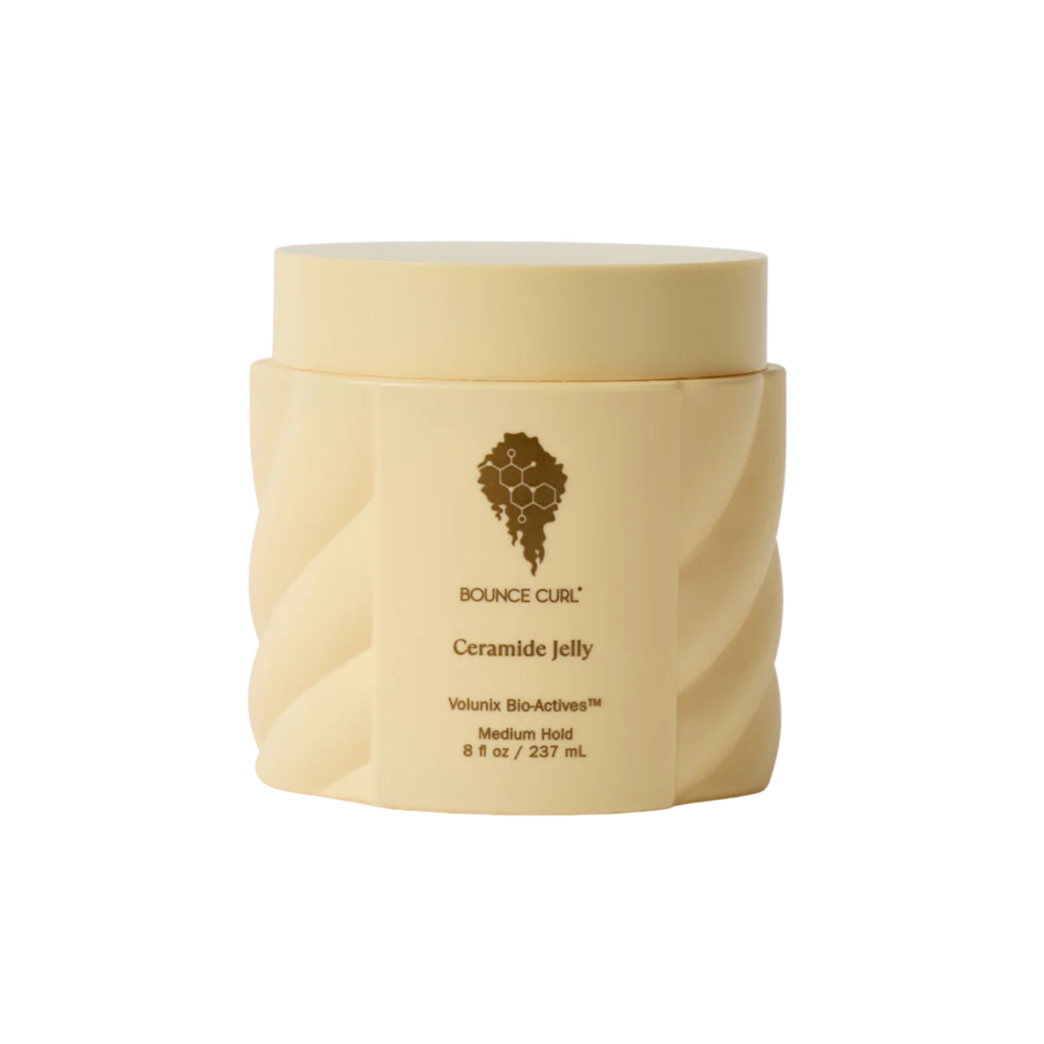 Bounce Curl Ceramide Jelly medium hold styling gel i 237 ml beholder med beige etiket og honningekam-logo.