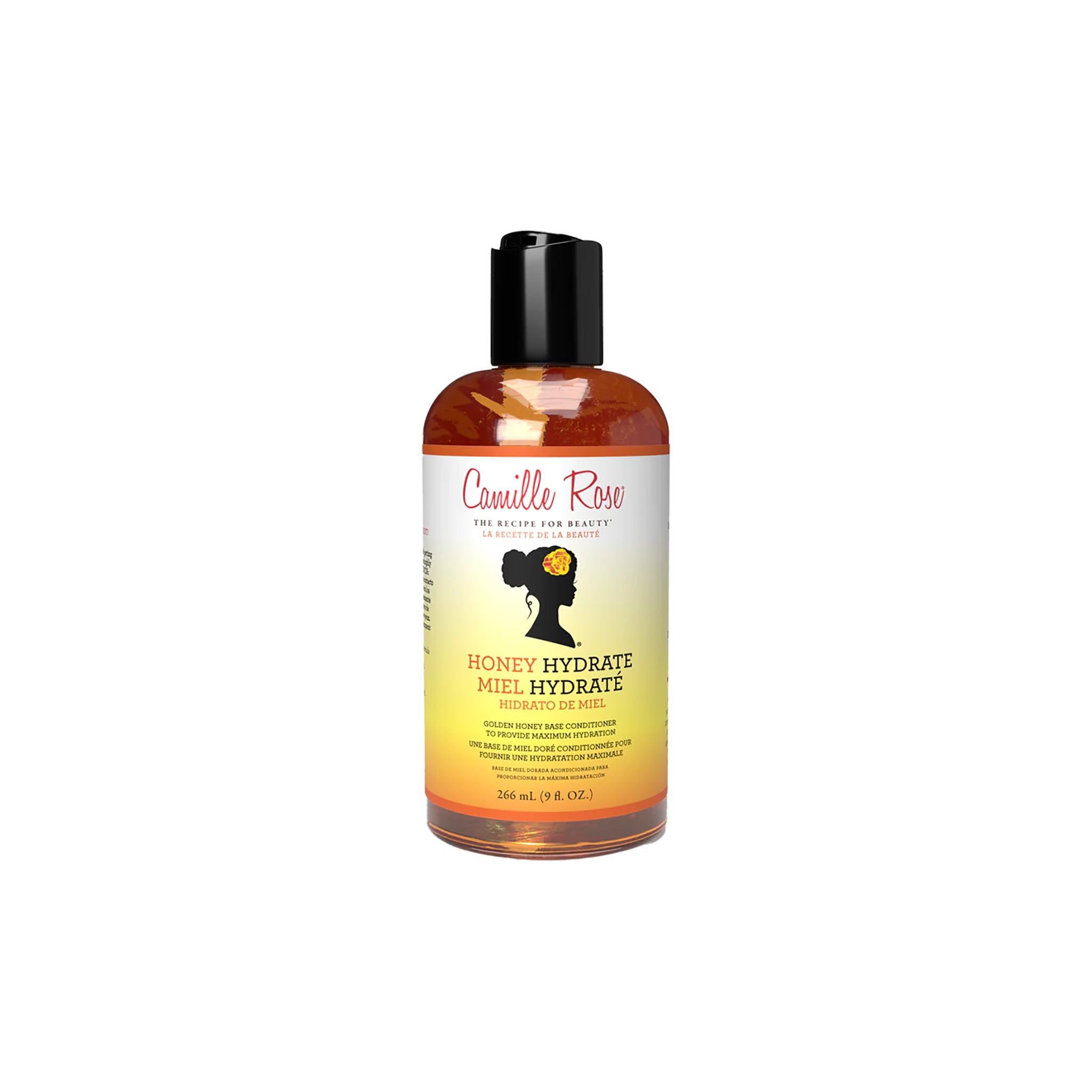 En klar flaske med en sort pumpe indeholdende Camille Rose Honey Hydrate Leave-In Conditioner. Produktet er placeret på en hvid baggrund.