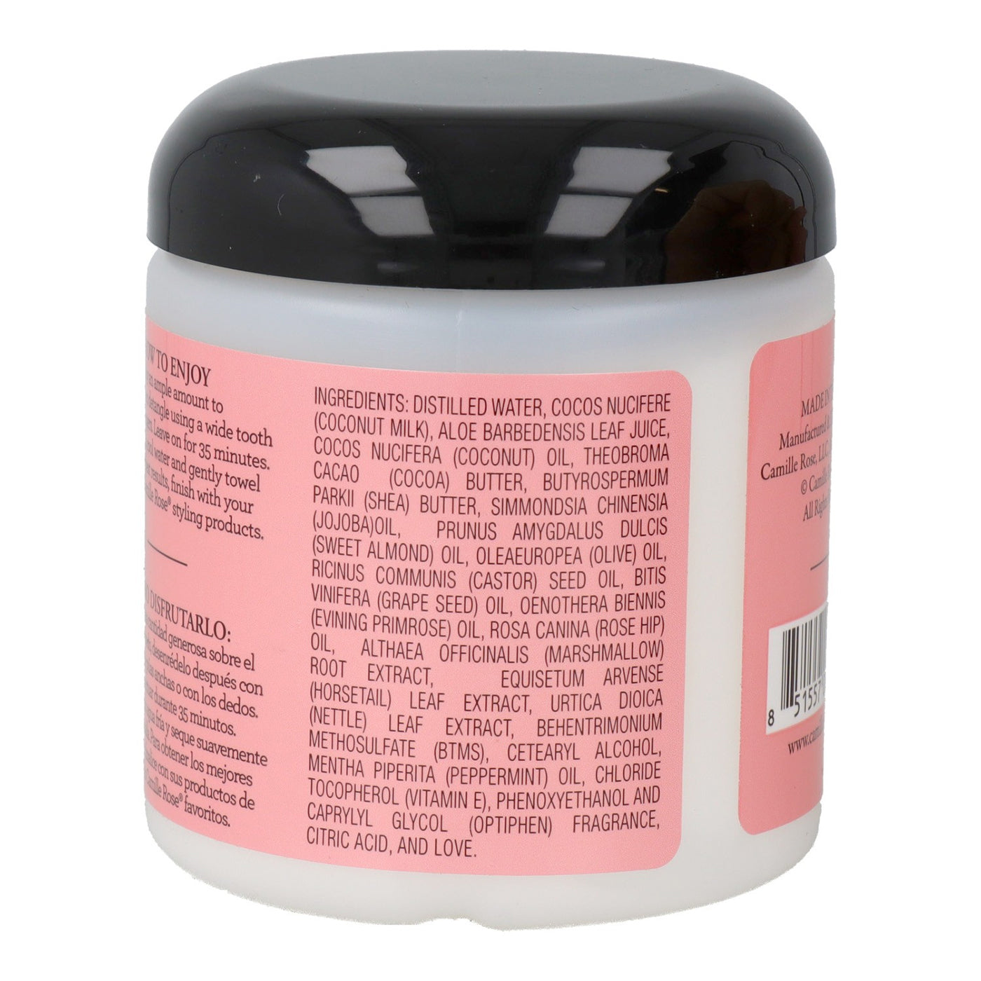 Bagside af en hvid krukke med lilla låg, der indeholder Camille Rose Jansyn's Moisture Max Conditioner. Etiketten viser ingredienslisten og produktinformation på engelsk.