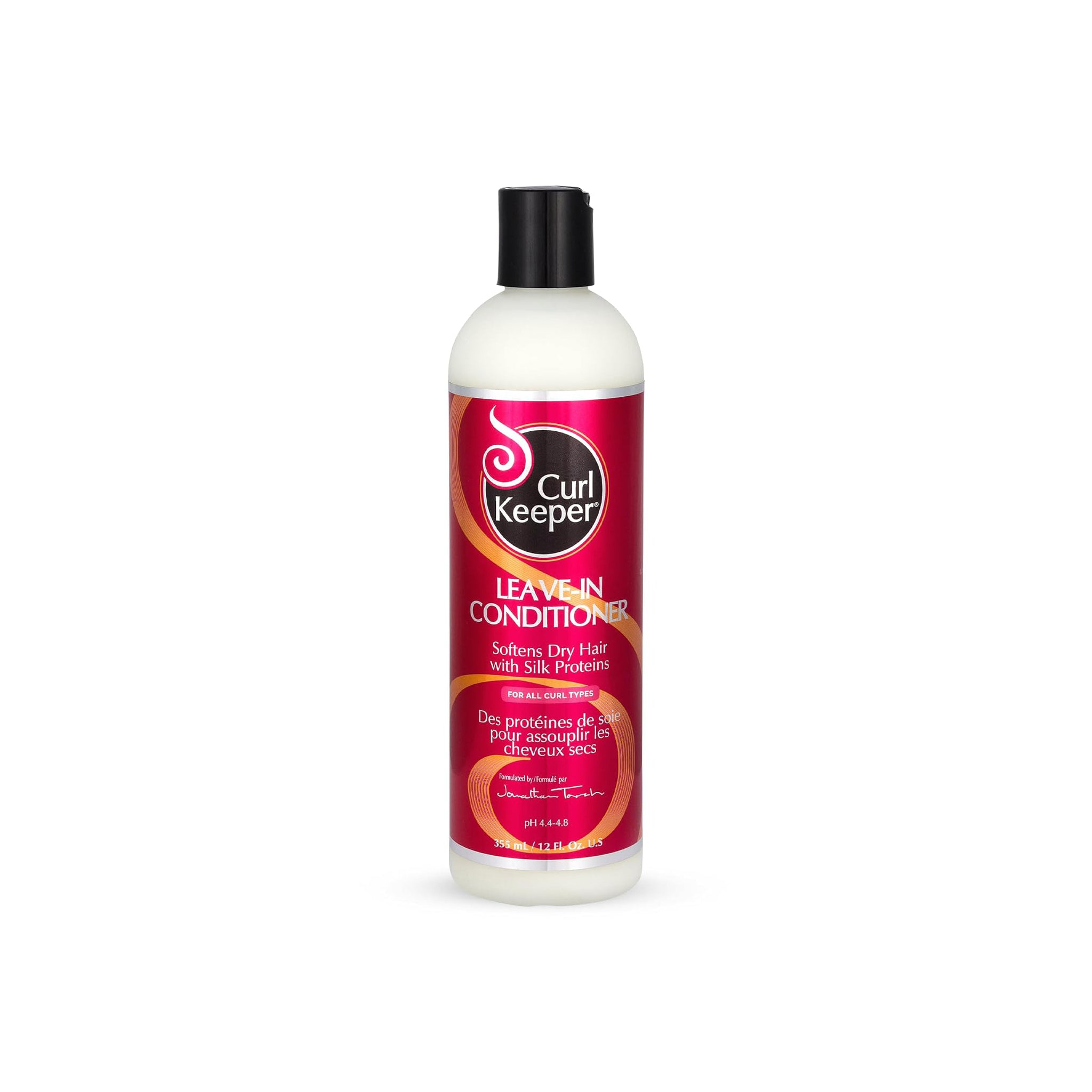 Flaske med Curl Keeper Leave-In Conditioner med rød etiket og sort låg.
