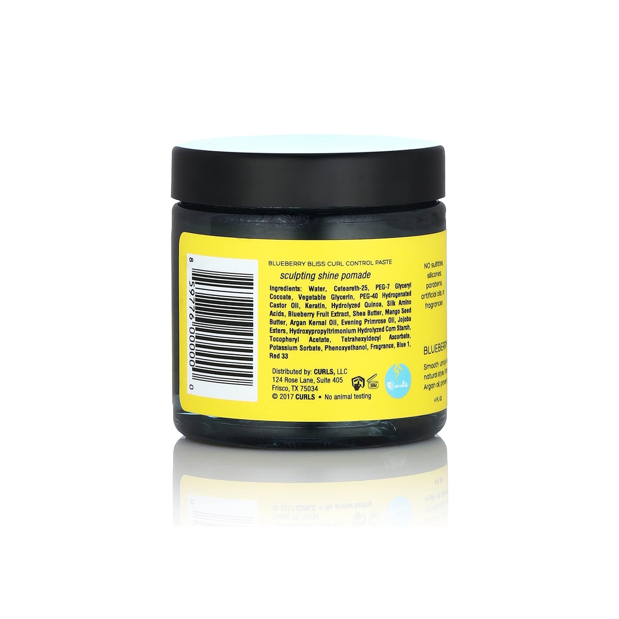 Nærbillede af bagsiden af Curls Blueberry Bliss Curl Control Paste, der viser ingredienser og produktinformation.