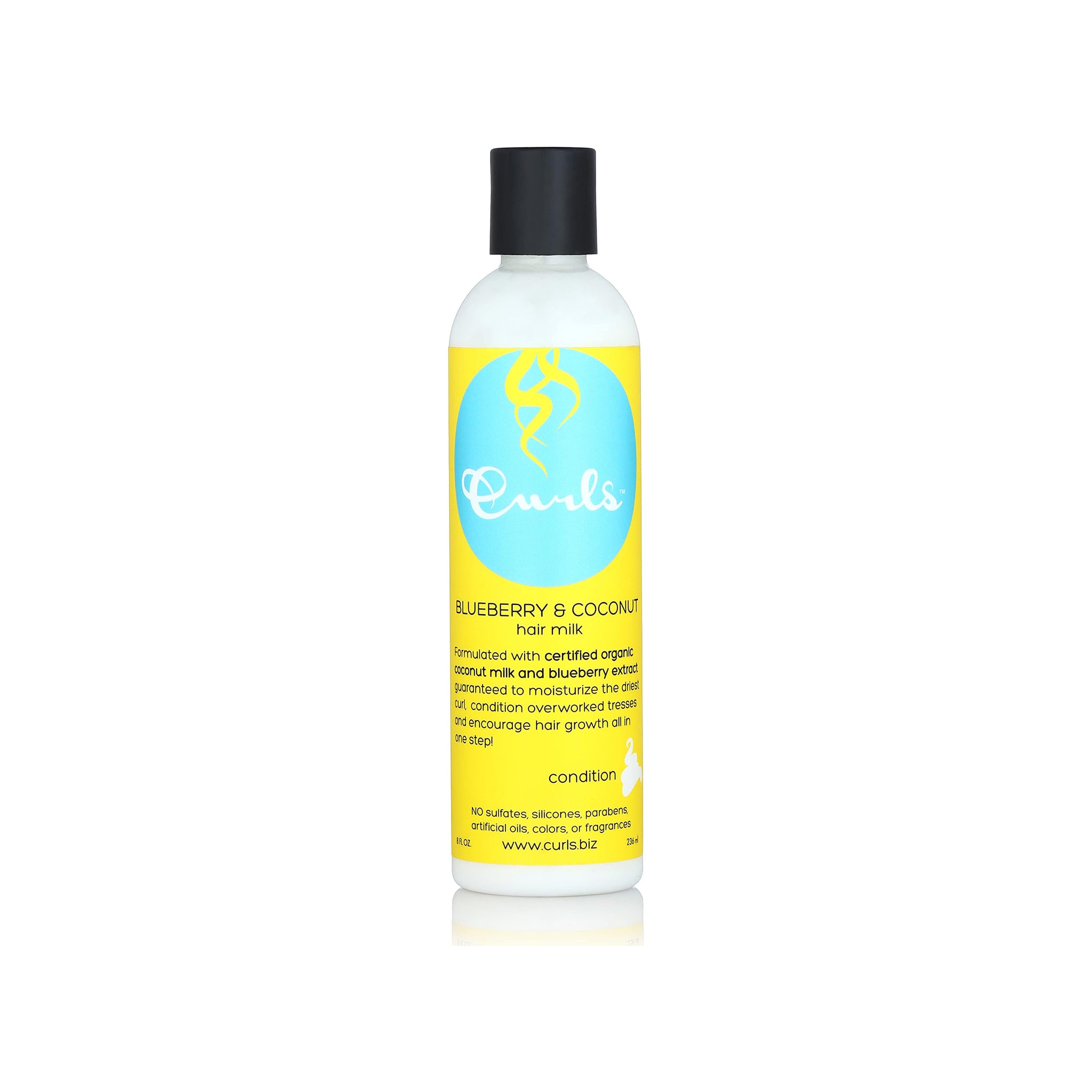 Flaske med Curls Blueberry & Coconut Hair Milk med gul etiket og sort låg.