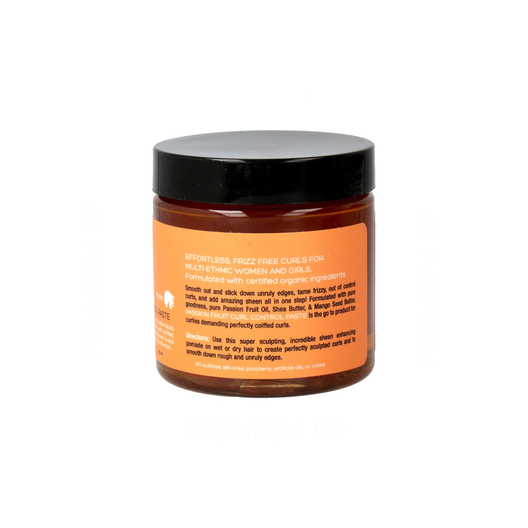 Curls Passion Fruit Curl Control Paste (120 ml) bagside. Orange etiket med produktbeskrivelse til definerede krøller og kontrol af krus.