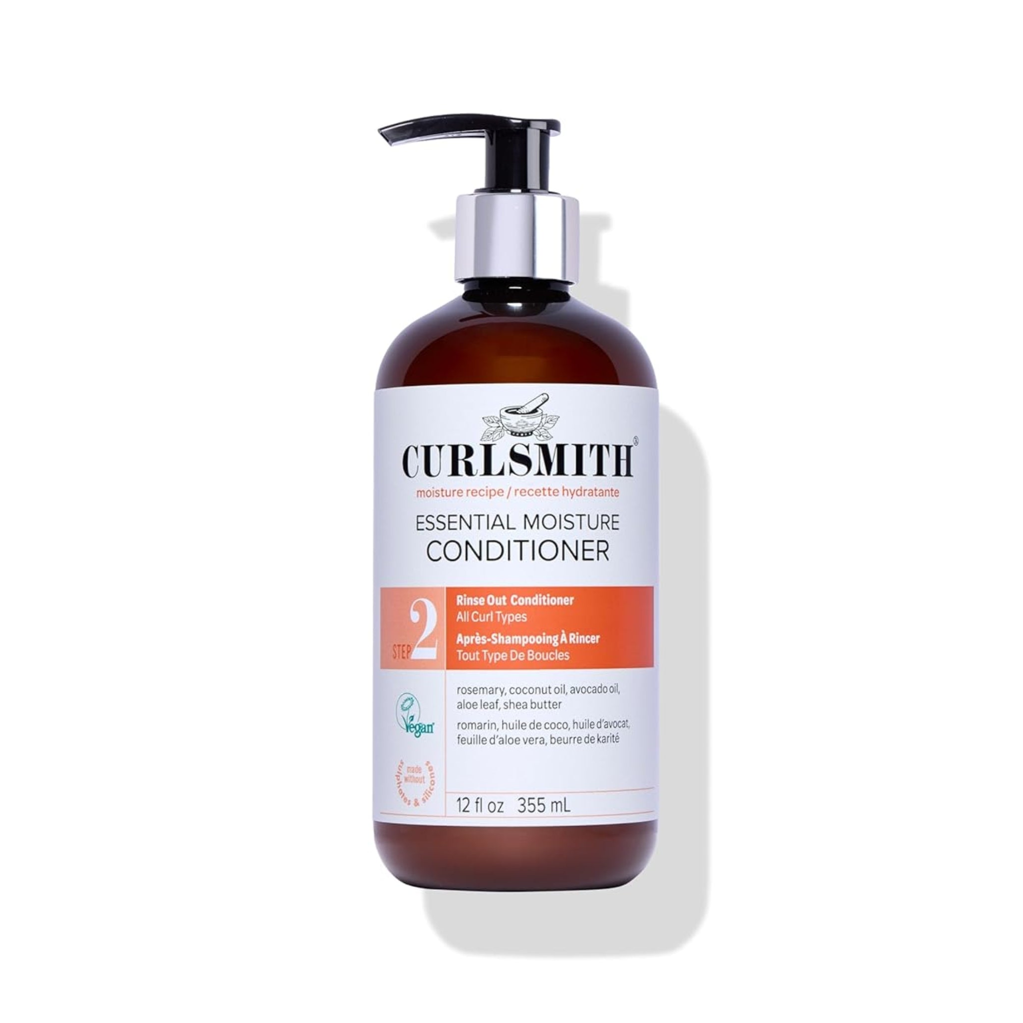 Curlsmith Essential Moisture Conditioner, brun pumpeflaske på 355 ml med orange og hvidt etiket.
