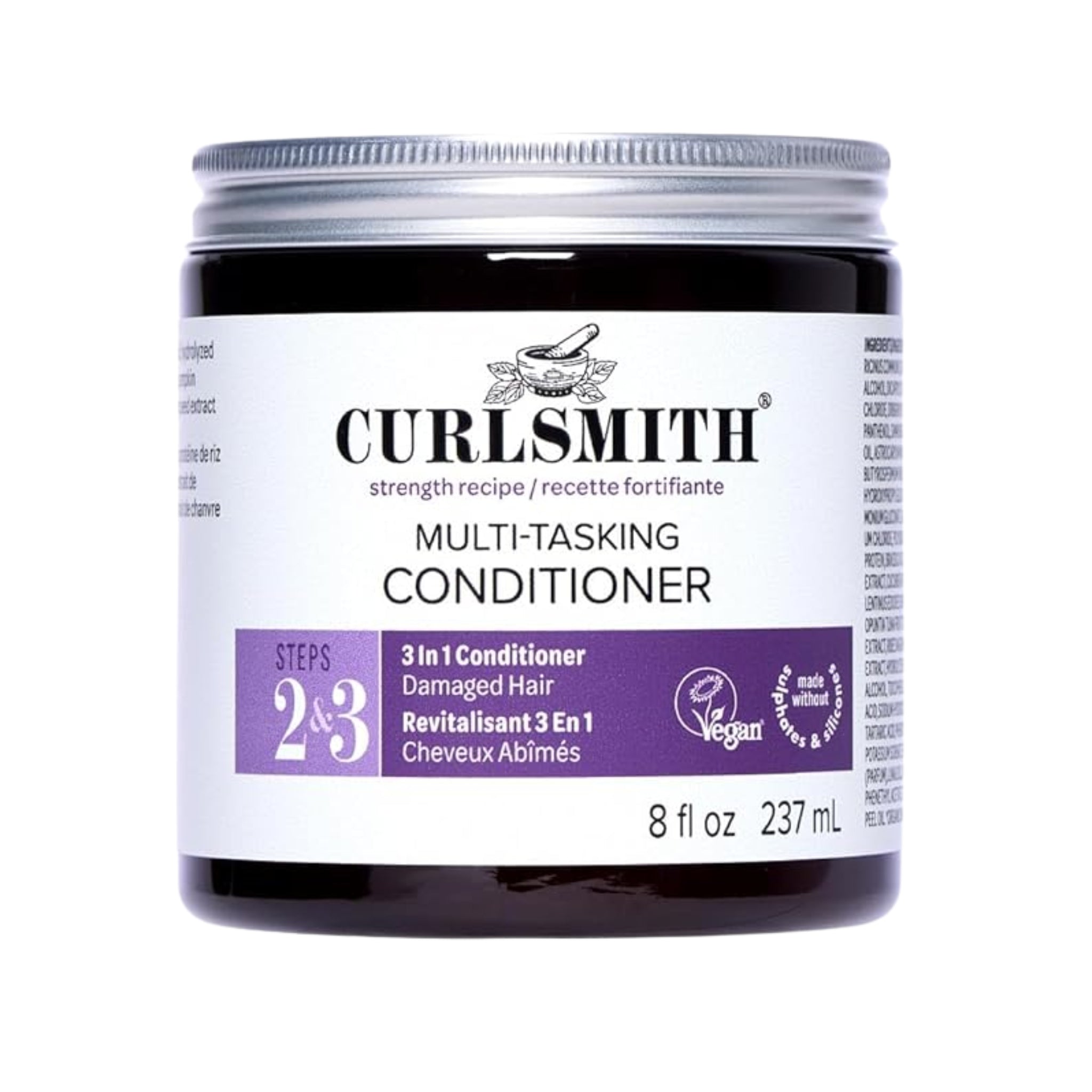 Curlsmith Multi-Tasking Conditioner i sort krukke med sølvlåg og lilla etiket til skadet hår, 237 ml.