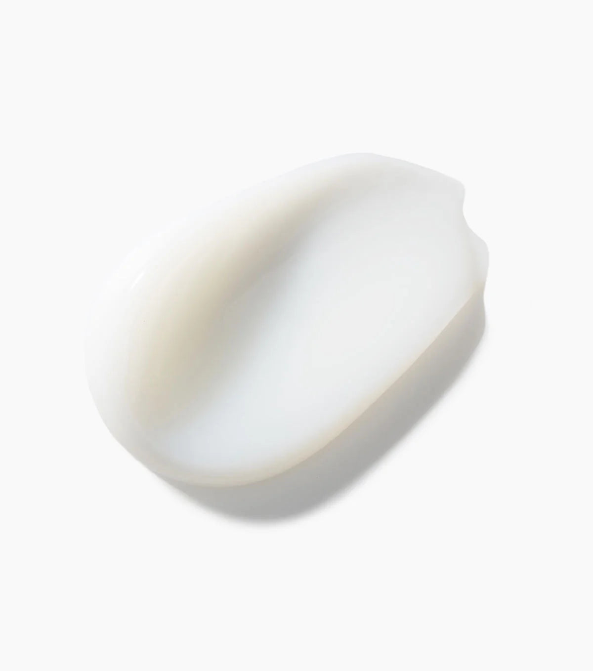 Keracare Curlessence fugtgivende krøllecreme. Nærbillede af cremens bløde, hvide konsistens.