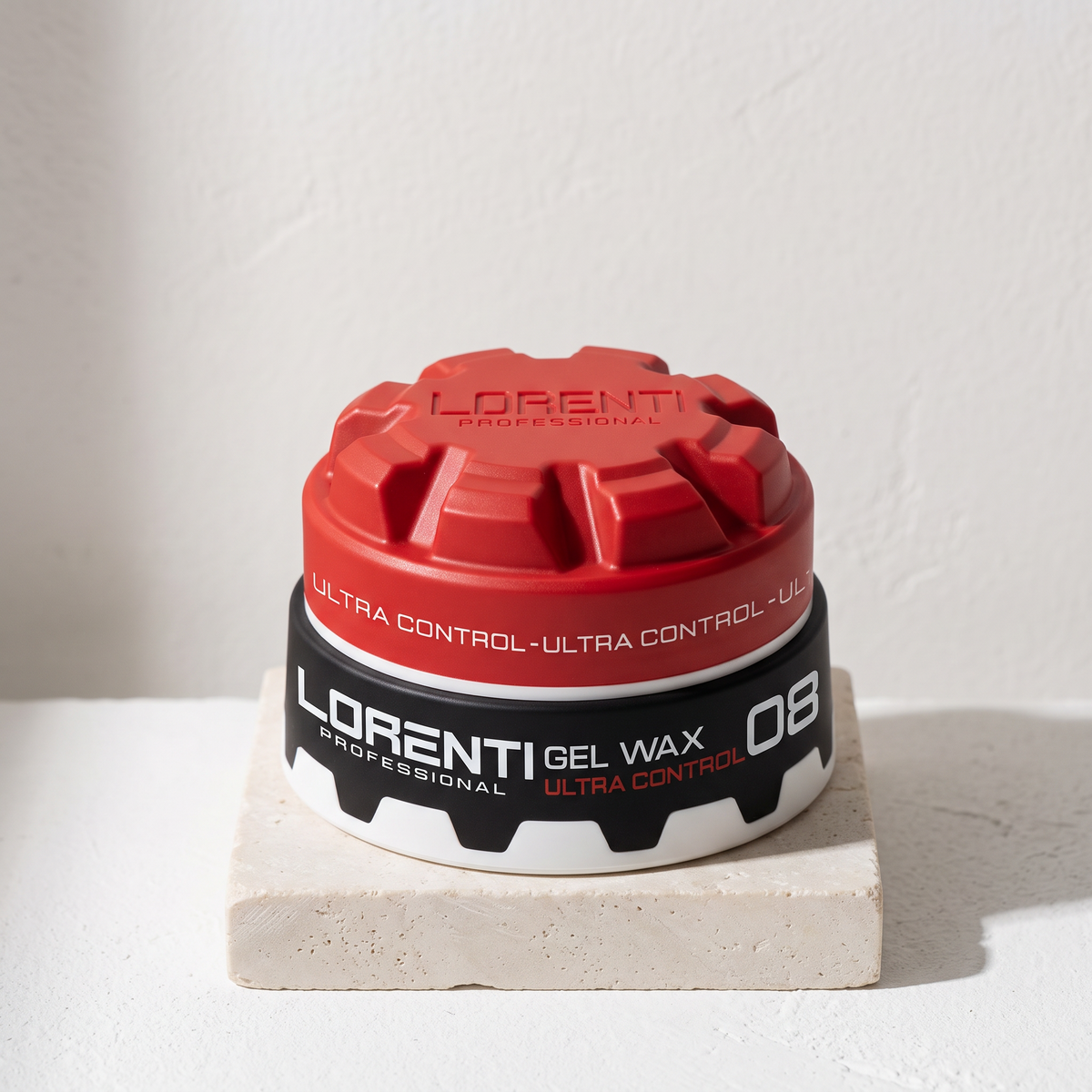 Lorenti Professional Gel Wax 08 Ultra Control i sort-hvid dåse med rødt låg på lys stenplade.