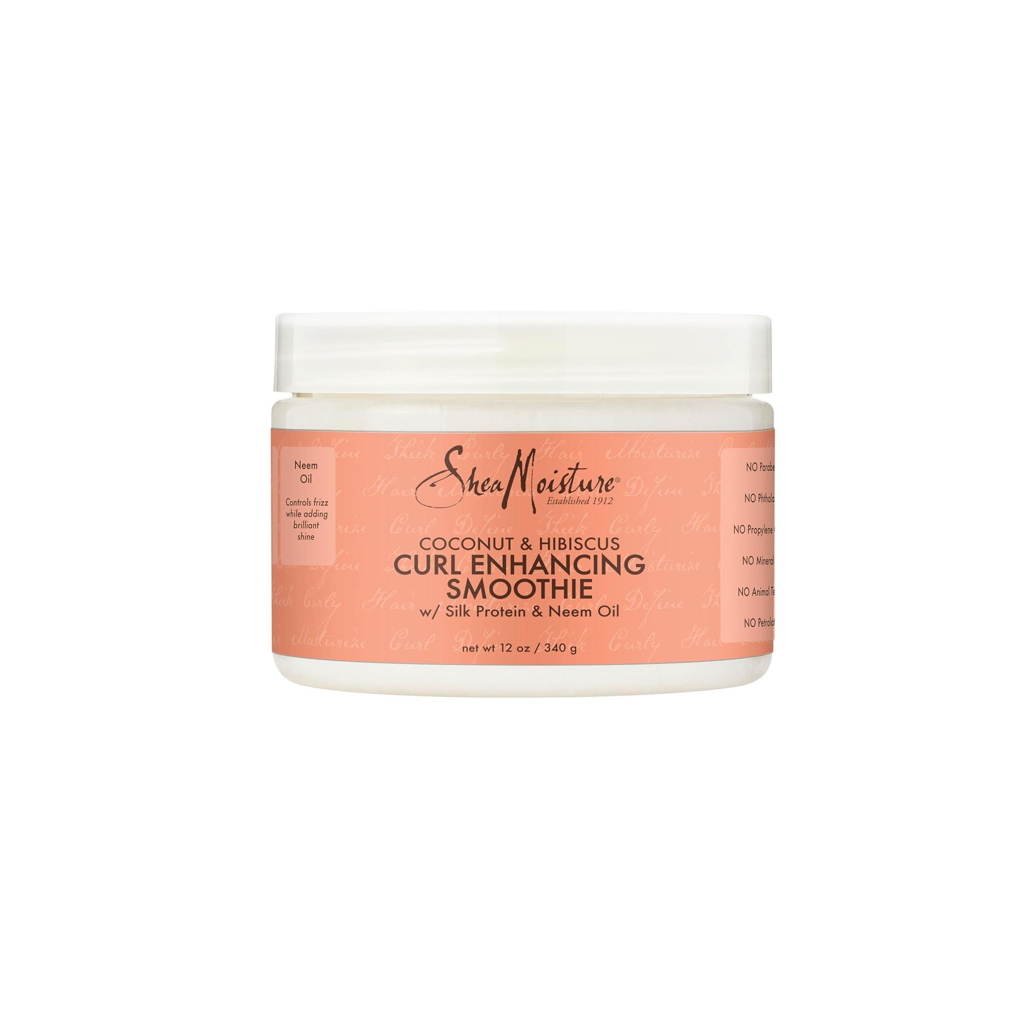 Hvid dåse i plast med hvidt låg indeholdende Shea Moisture Coconut & Hibiscus Curl Enhancing Smoothie (340 g). Etiketten er beige/lyserød med sort og rød tekst.