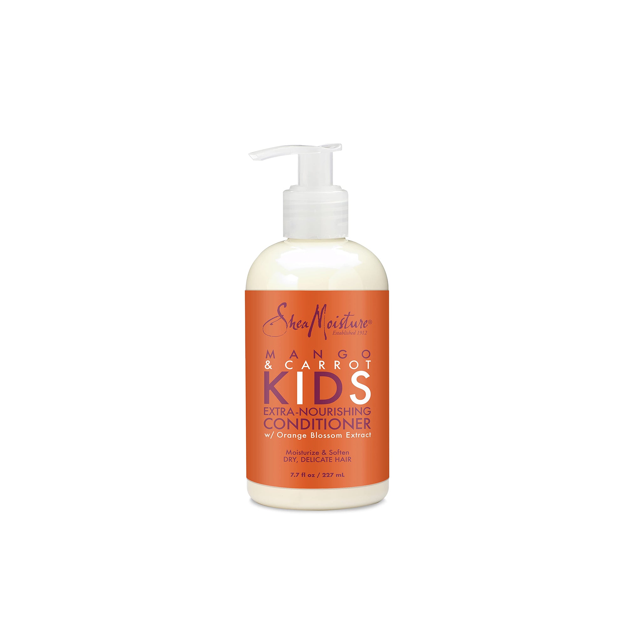 Hvid flaske med orange etiket med teksten "Shea Moisture Mango & Carrot Kids Ekstra Nærende Balsam".