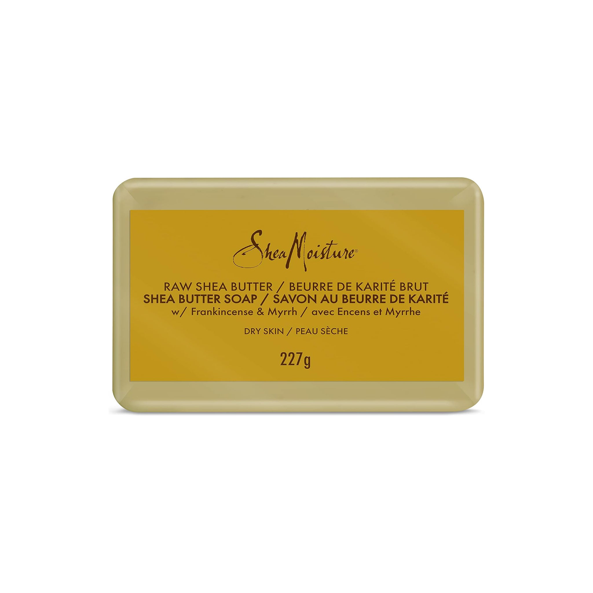 Shea Moisture Raw Shea Butter Soap (227g) - Bagside. Billedet viser bagsiden af sæben med information om ingredienser (sheasmør, frankincense og myrra) og at den er velegnet til tør hud.