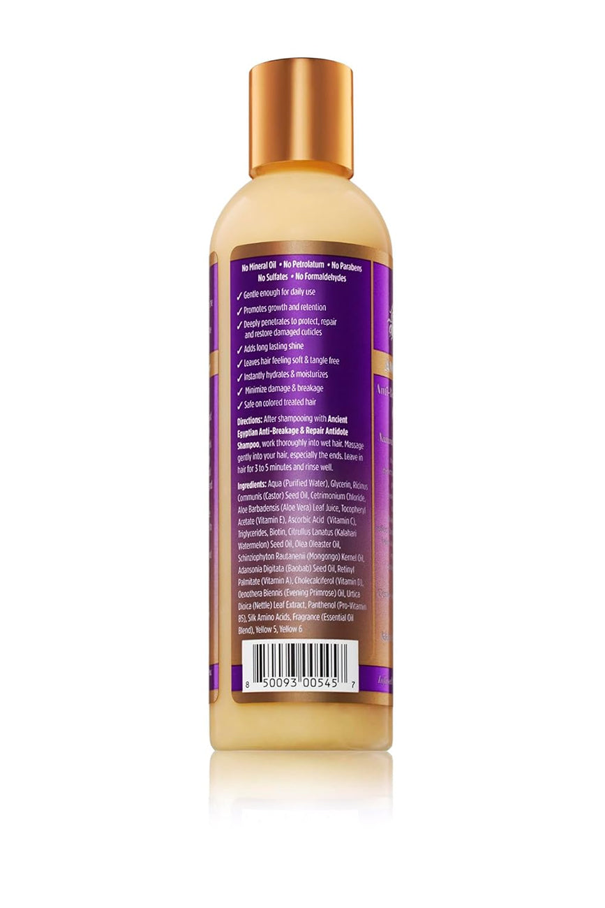 Bagsiden af en gennemsigtig flaske med guld låg indeholdende The Mane Choice Ancient Egyptian Anti-Breakage & Repair Antidote Conditioner. Etiketten indeholder instruktioner om brug efter shampoo og en liste over ingredienser.