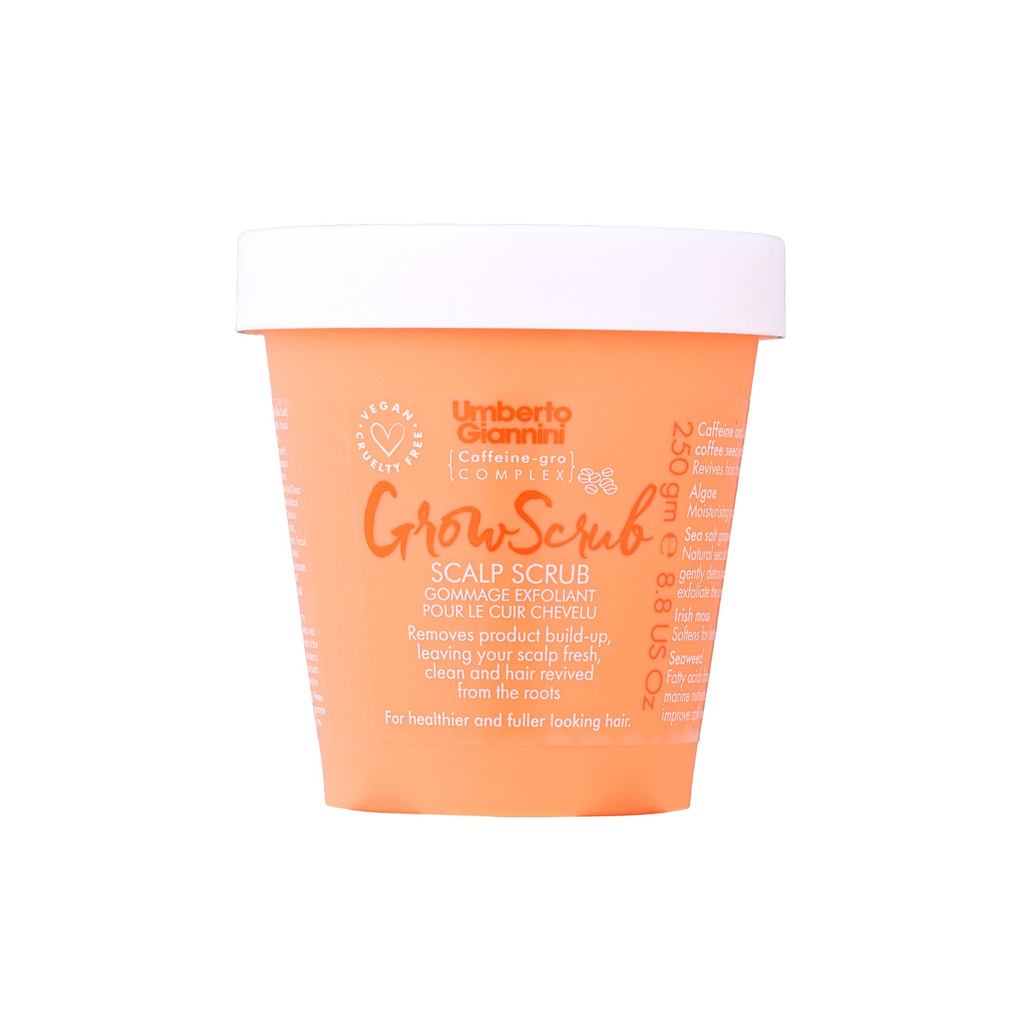 Orange beholder med Umberto Giannini Grow Scrub scalp scrub til sundere hovedbund og fyldigere hår.